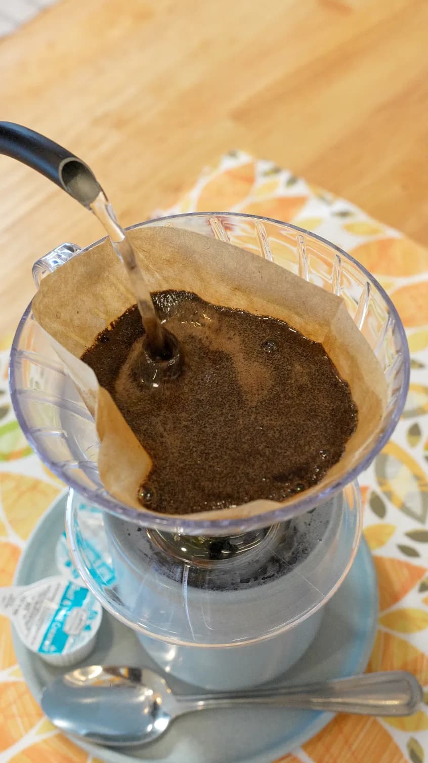 Floré drip coffee prepared with a pour-over coffee brewer